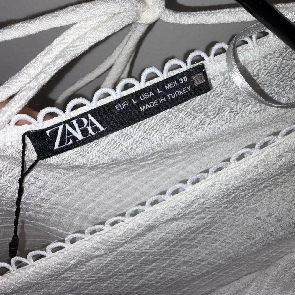 NWT Zara White Ruffled Peplum Blouse Tie Back Flutter Sleeve Size L - Picture 3 of 5